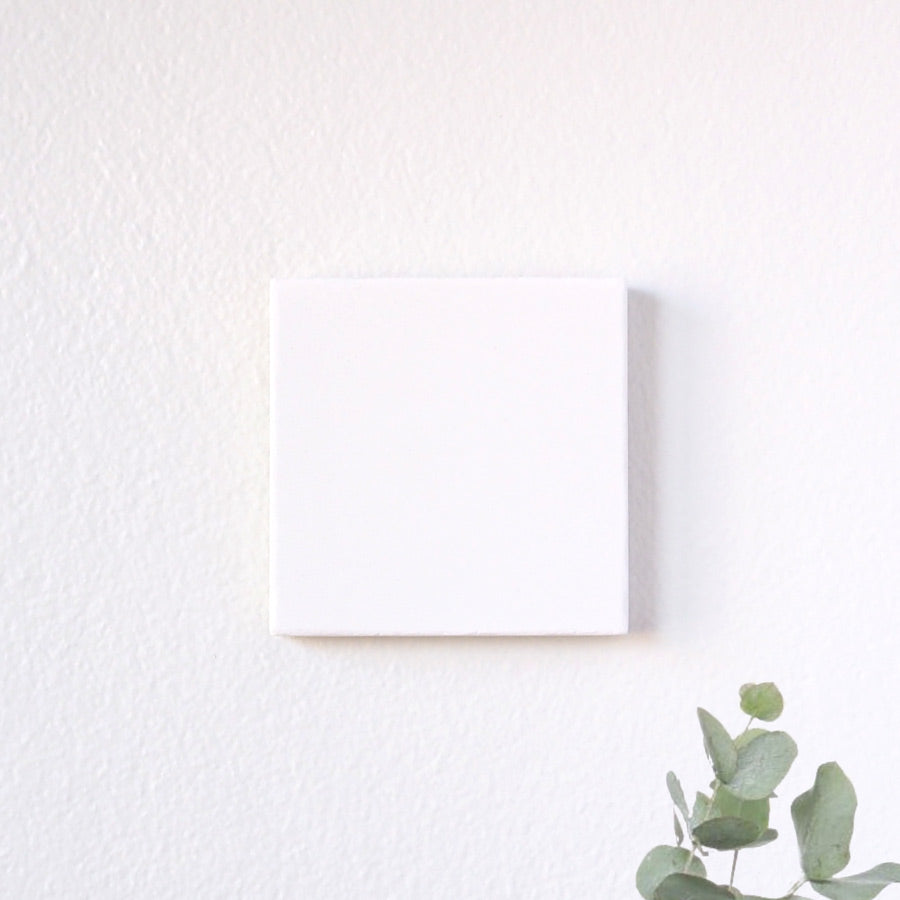 Square stone tile featuring a custom photo – handcrafted with a smooth, natural matte finish