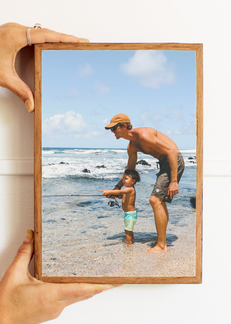 Father and son fishing at the beach – custom photo print on stone, framed in reclaimed timber